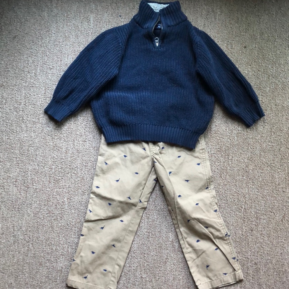 Dinosaur pants and blue sweater, boys